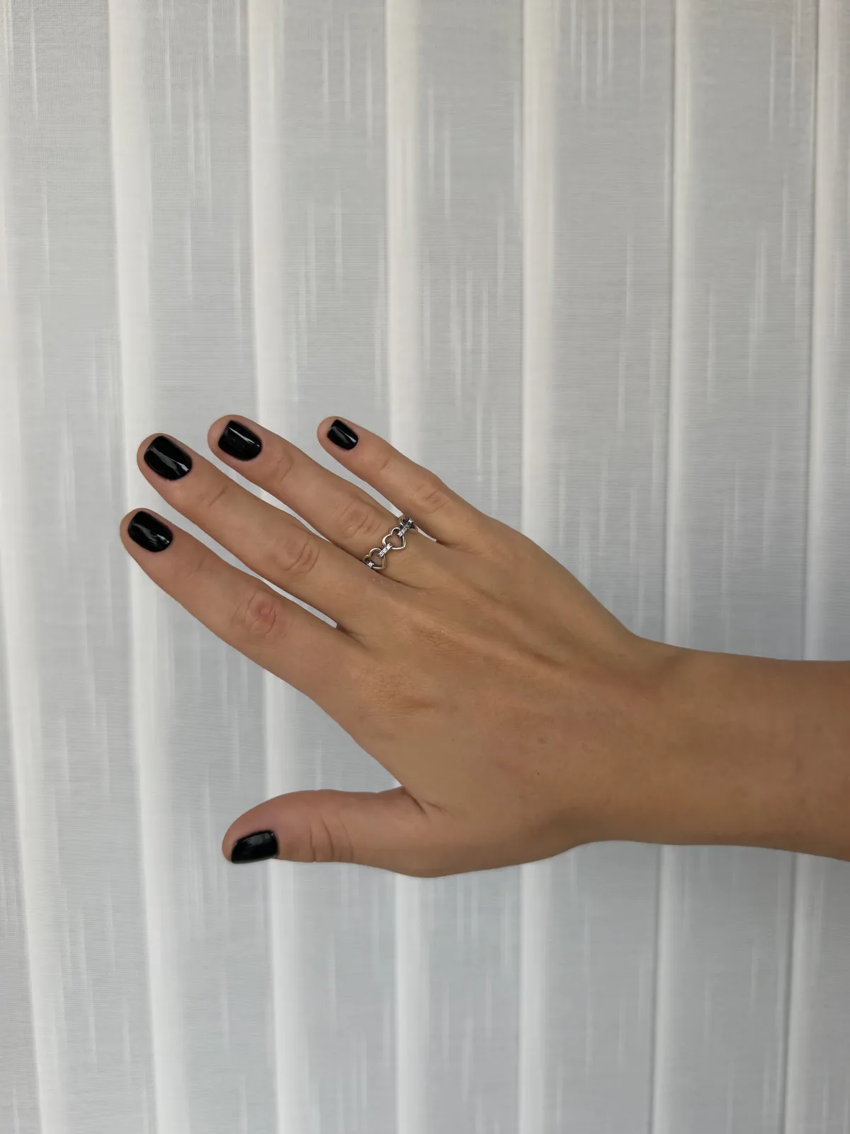 Anillo corazones entrelazados