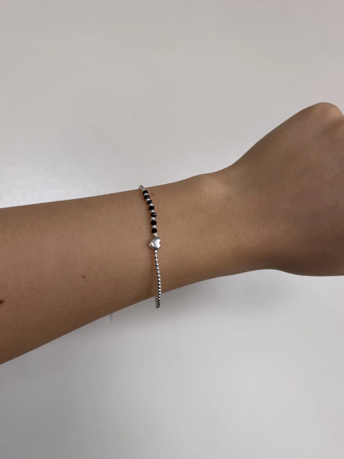 Pulsera corazon negra