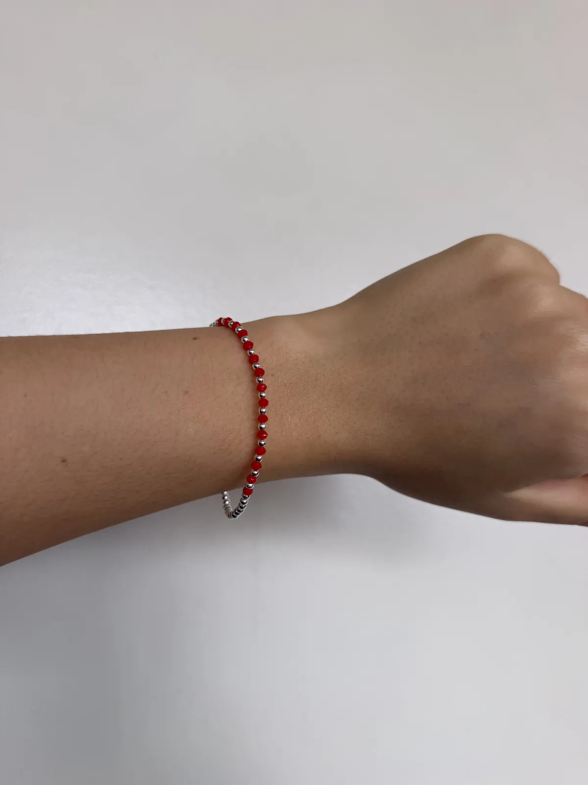 Pulsera elastica toque rojo